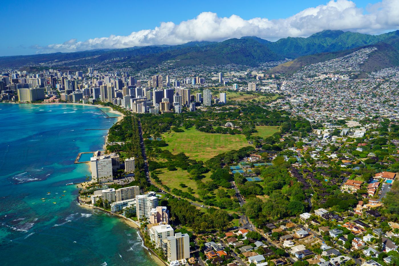 Aerial view of Waikīkī Beach, turquoise ocean, and Honolulu